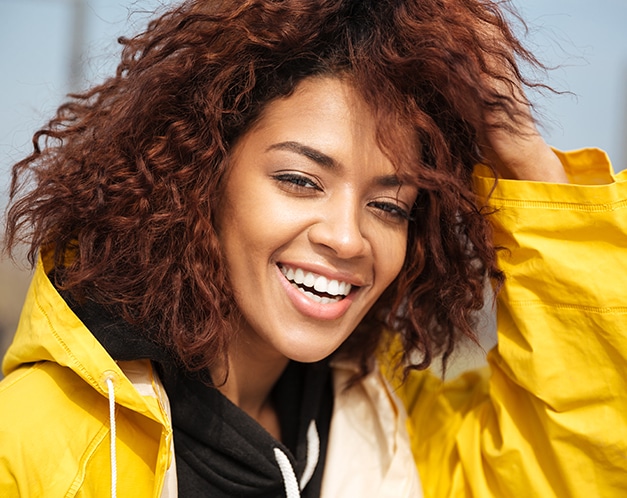 Girl confidently smiling after  Cosmetic dentistry in Altamonte Springs